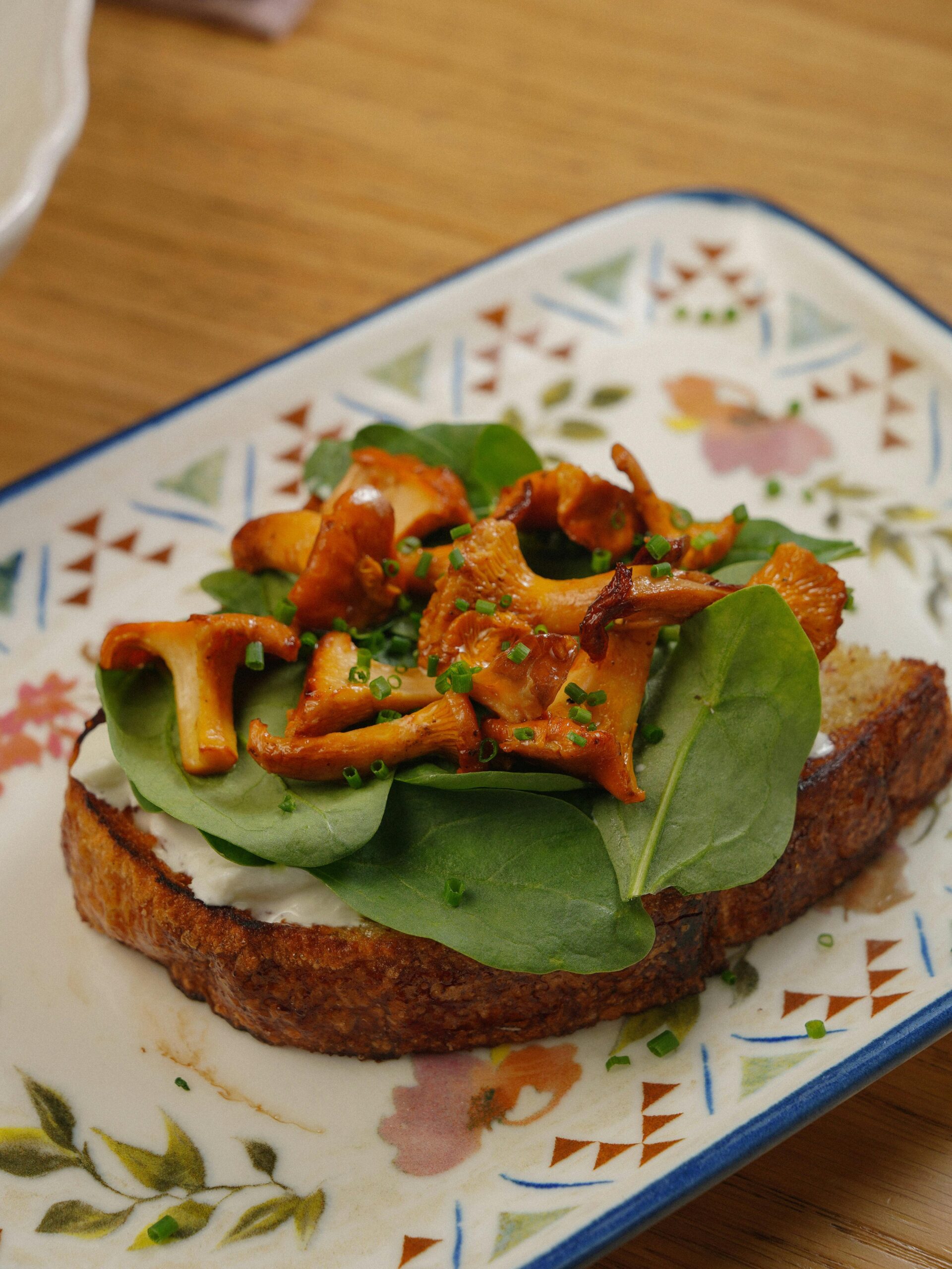 Chestnut Mushroom Toast with Garlic, Thyme and Ricotta featuring delicious open-faced sandwich with chestnut mushrooms and spinach on a rustic toast.