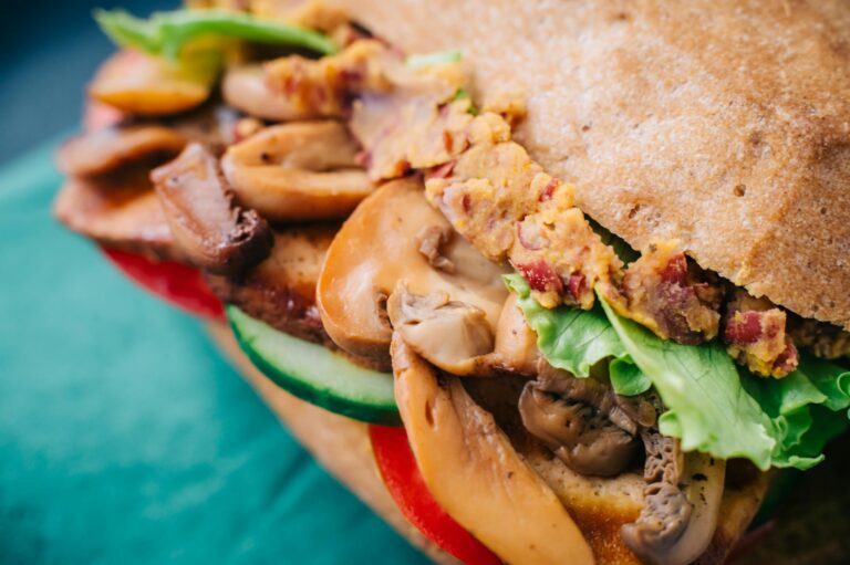 Crispy Italian Oyster Mushroom Sandwich - Delicious mushroom sandwich with fresh vegetables and crispy bread. Perfect for food lovers.